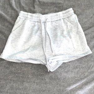 Light grey shorts.